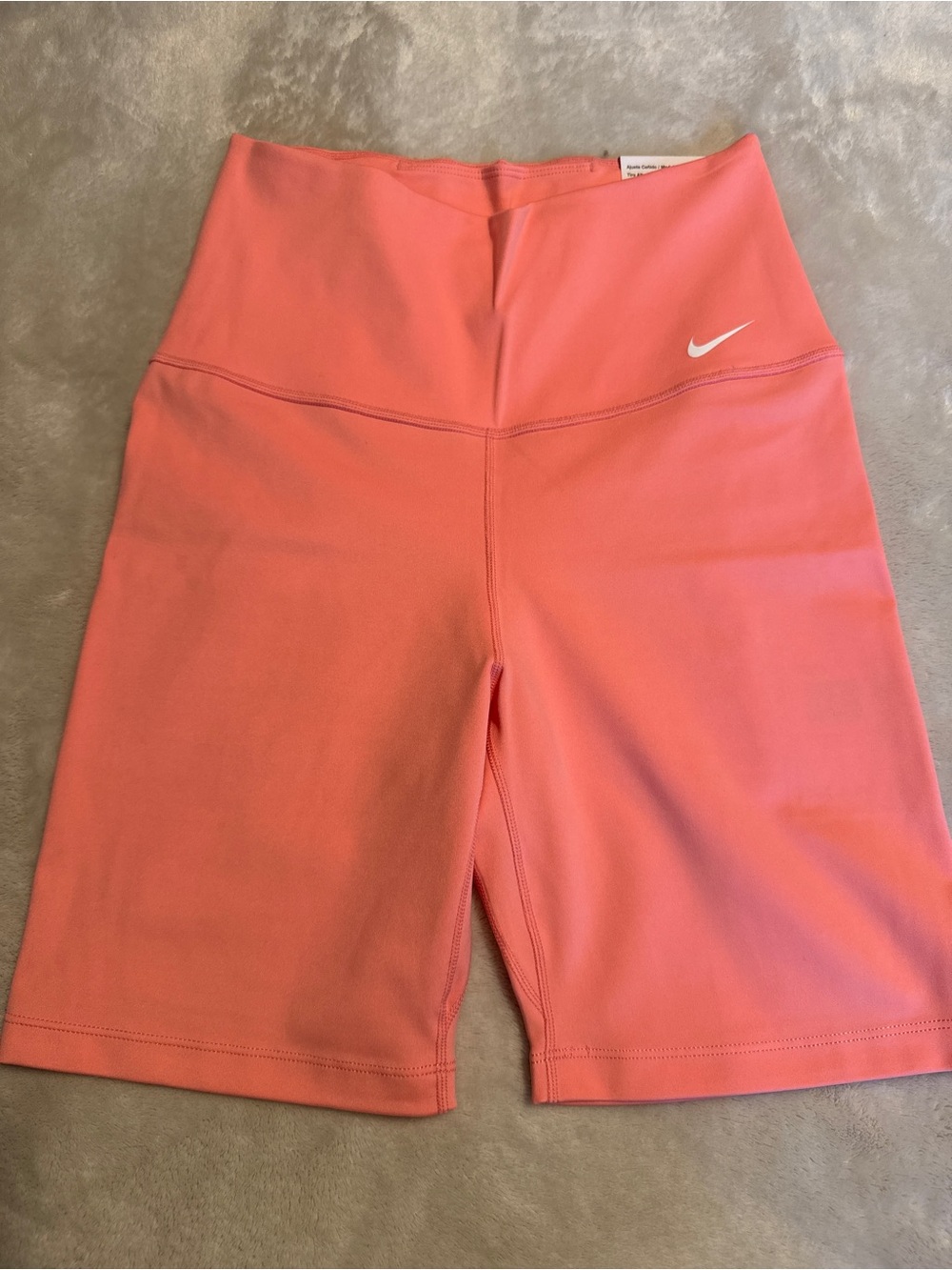 Nike Coral High-Rise Bike Shorts with White Swoosh